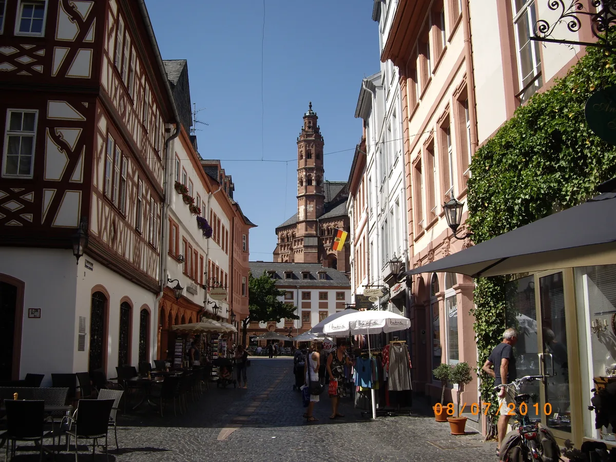 Half-timbered houses on the Kirschgarten in Mainz, the cathedral tower behind them